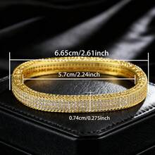 1 chiếc vòng tay mạ vàng 18K, thích hợp cho các dịp trang trọng như dạ hội và đám cưới. Một món quà thanh lịch và sang trọng dành tặng mẹ hoặc người yêu nhân dịp năm mới hoặc kỷ niệm. - Vàng - Xem 2