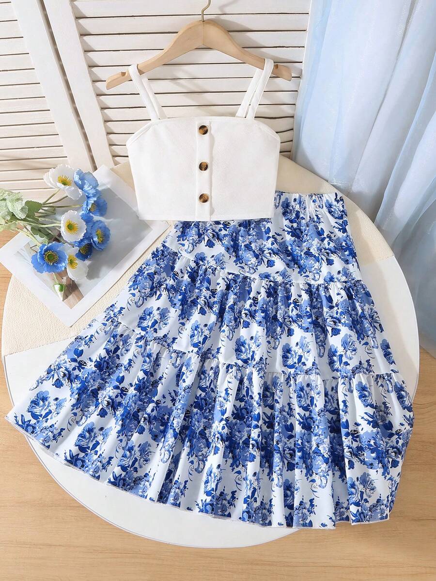 Bộ 2 món cho bé gái, gồm áo croptop trắng mềm mại, dáng ôm và chân váy xòe họa tiết hoa màu nước xanh trắng. - Nhiều màu - Xem 1