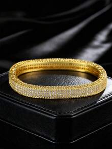 1 chiếc vòng tay mạ vàng 18K, thích hợp cho các dịp trang trọng như dạ hội và đám cưới. Một món quà thanh lịch và sang trọng dành tặng mẹ hoặc người yêu nhân dịp năm mới hoặc kỷ niệm. - Vàng - Xem 1