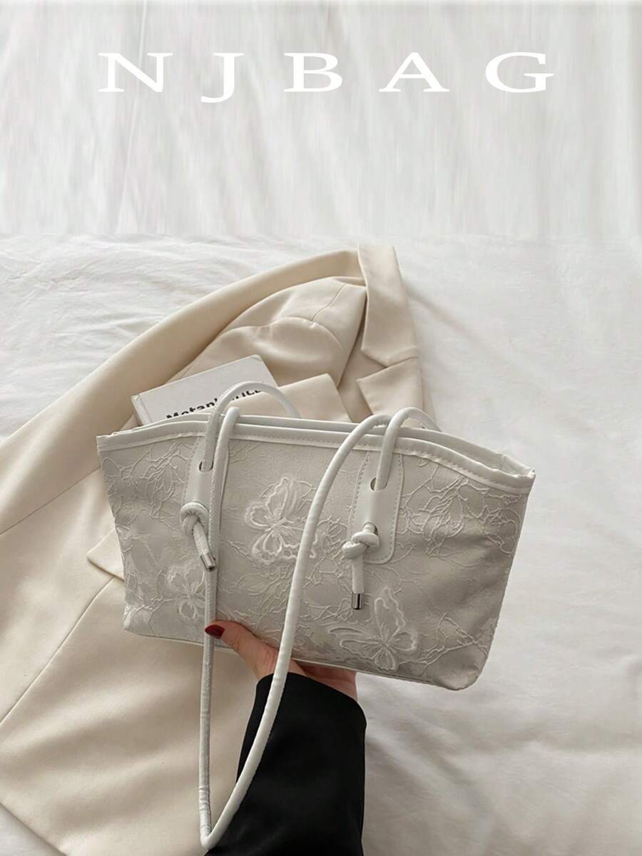 1个蝴蝶蕾丝拉链保龄球包，大容量手提包，新款时尚纹理单肩包，复古风格腋下通勤包，适合女性日常使用