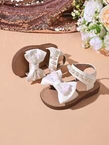 "Girls' Sparkly Bow & Pearl Sandals – Adjustable Hook And Loop Strap, Soft Padded Footbed, Glitter Accents, Stylish Summer Party Kids Footwear" - White - View 2