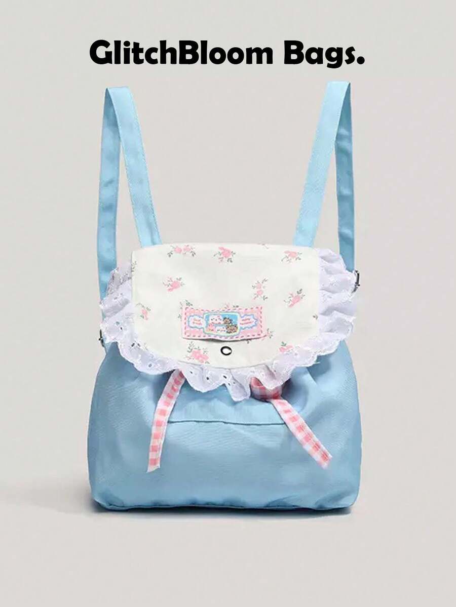 GlitchBloom 背包。时尚清新可爱的花卉猫咪印花帆布背包，适合女大学生、青少年、女性或学生，可装书籍、购物物品、返校用品等。它是女性、女孩和学生的必备学习用品，可与各种背包配件、文具和书包完美搭配。 - 藍色 - 查看 1