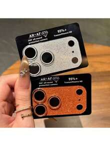 Protetor de Lente de Câmera para iPhone 17 Pro/17 Pro Max, Placa Protetora de Câmera com Diamantes Brilhantes, Vidro Temperado Ultratransparente, Dureza 9H, Antirriscos, Fácil Instalação, Prata e Laranja com Glitter. Ideal para uso diário, escritório e casa. Capa Protetora para Câmera de Celular com Cristais Brilhantes, À Prova D'Água, Resistente a Choques, Quedas e Arranhões. - A - Ver 1