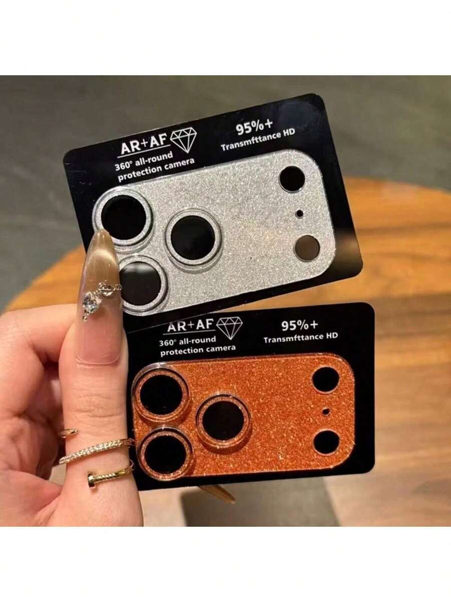 Protetor de Lente de Câmera para iPhone 17 Pro/17 Pro Max, Placa Protetora de Câmera com Diamantes Brilhantes, Vidro Temperado Ultratransparente, Dureza 9H, Antirriscos, Fácil Instalação, Prata e Laranja com Glitter. Ideal para uso diário, escritório e casa. Capa Protetora para Câmera de Celular com Cristais Brilhantes, À Prova D'Água, Resistente a Choques, Quedas e Arranhões. - A - Ver 1