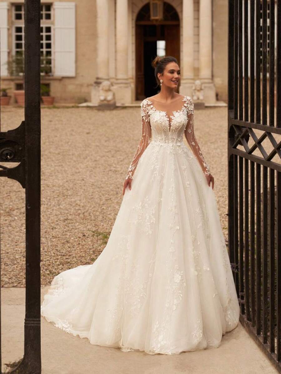 Enchanting Sheer Neck Lace Long Sleeve 3D Lace Appliqué Tulle A-Line Wedding Dress With Train, Wedding Dresses For Bride, Elegant And Comfortable, Includes Plus Sizes, Bridal Gown, Formal Dresses For Women, Suitable For Wedding, Party, Vacation, Bride, Formal Occasions, Dinner Dress, Prom Dress, After-Party Dress, Homecoming Dress, Cocktail Party, Birthday Party, Celebration, Gala, Festival, Ceremony - trắng - Xem 1