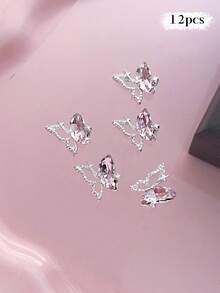 12/240件粉色系列金属美甲饰品：心形、行星、月亮、十字架、蝴蝶结、泰迪熊、星光、水钻银色美甲装饰，奢华金属美甲用品，闪亮粉色水晶美甲宝石，适用于多功能DIY美甲配件 - 彩色 - 查看 30