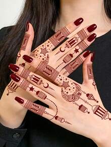 4片红色指甲花手指纹身贴纸，饰有指甲花花卉图案，包括花朵、星星、月亮等设计。它们适用于手指、指甲和手部艺术装饰，是派对、婚礼和其他场合的完美之选。 - 紅色 - 查看 3