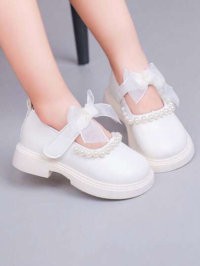 1双女童新款珍珠蝴蝶结装饰公主平底鞋，减震防滑儿童真皮鞋，韩版百搭女童舞蹈鞋，四季皆宜