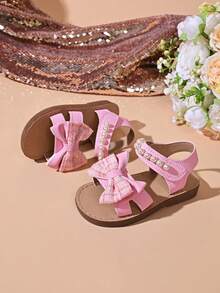 "Girls' Sparkly Bow & Pearl Sandals – Adjustable Hook And Loop Strap, Soft Padded Footbed, Glitter Accents, Stylish Summer Party Kids Footwear" - Pink - View 5