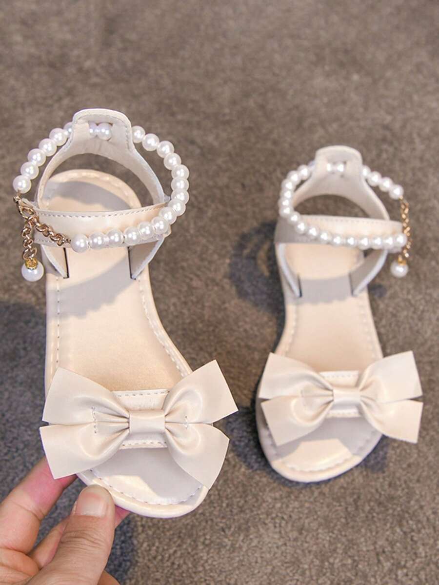 1 Pair Girls' White Flat Sandals, Made Of Soft PU Material, Decorated With Butterfly Pattern, Minimalist Pearl And Metal Buckle Design, Open Toe Style, Lightweight And Fashionable, Suitable For Girls Aged 3-15, Ideal For Casual, Party, Beach, Holiday Activities, Spring/Summer 2026 - Beige - View 1