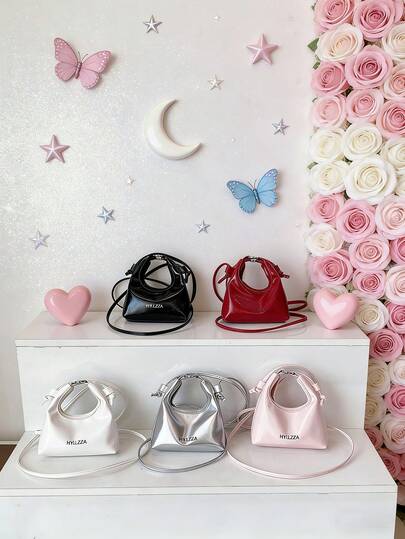 This New 1pc Mini Minimalist Tote Bag Is Casual, Simple, And Stylish. The Adjustable Shoulder Strap Makes It Suitable For Teenagers, Everyday Outings, Shopping, And Travel. It's Portable And Suitable For All Seasons. It Easily Holds Daily Essentials, Is A Versatile Fashion Item, And Suits Various Styles And Occasions. It Also Makes A Great Gift For Friends.