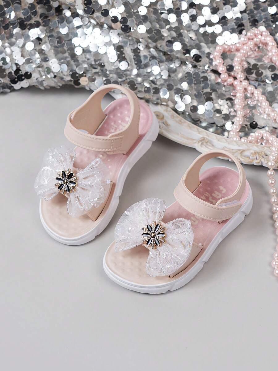软底防滑平底蝴蝶结儿童凉鞋，韩版夏季新款百搭女童沙滩鞋 - 米色 - 查看 1