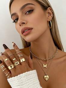 Set de 12 anillos apilables con diseño de mariposa hueca con tono dorado, diseño de moda, adecuado como regalo del Día de San Valentín, para combinar con atuendos, anillos de nudillo - Juego de 12 piezas - Ver 1