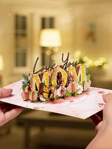 1张3D立体弹出式母亲节贺卡，饰有闪亮金色“妈妈”字样、蝴蝶和花朵图案，是一款适合送给妈妈、奶奶、妻子的精美贺卡，也可作为手工生日礼物。 - 彩色 - 查看 3