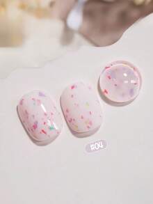 15毫升容量，2026秋冬圣诞季新款女士圣诞礼盒套装，包含流行的甜酸奶冰淇淋糖片、波点、彩色大小亮片、贝壳玻璃纸凝胶指甲油，适合四季美甲。搭配底油和封层使用，需配合UV灯使用。 - 彩色 - 查看 14