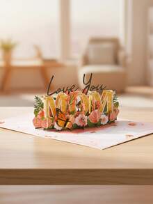 1张3D立体弹出式母亲节贺卡，饰有闪亮金色“妈妈”字样、蝴蝶和花朵图案，是一款适合送给妈妈、奶奶、妻子的精美贺卡，也可作为手工生日礼物。 - 彩色 - 查看 9