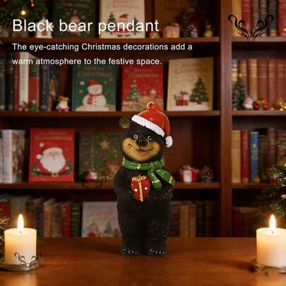 一只小黑熊圣诞吊坠，精致的圣诞树装饰吊坠，可收藏的装饰品，适合桌面摆放，可作为礼物，质地细腻不易损坏，适合节日装饰。