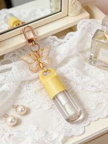 Ống son bóng trong suốt 5ml kèm móc khóa hình bướm, chai son bóng hình bướm có thể dùng để nạp lại, ống son bóng trong suốt có cọ, ống đựng dầu dưỡng môi, chai son bóng di động có thể dùng làm móc khóa/phụ kiện túi xách - Nhiều màu - Xem 2