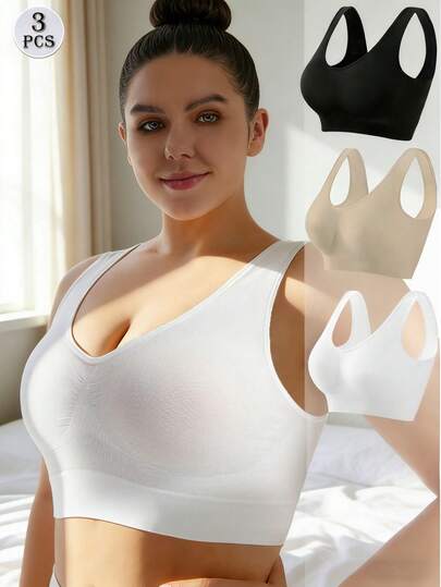 三件套加大码无缝修身运动背心套装，白色、黑色、米色。这款背心采用柔软面料，易于搭配各种日常服装，适合跑步、骑行、瑜伽、健身和休闲活动。采用高密度、高弹面料制成，舒适耐穿，四季皆宜，可机洗或干洗。