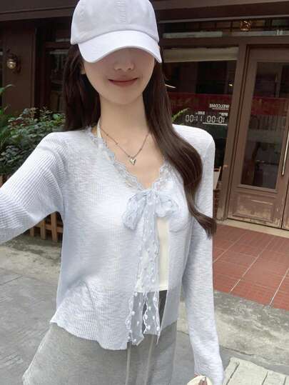 早春韩版蓝色短款V领长袖轻薄开衫，蕾丝系带薄针织外套，春夏款