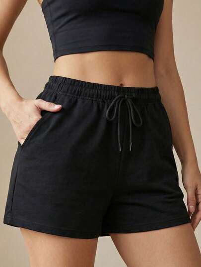 女士纯色休闲运动短裤，弹性腰带抽绳设计，带口袋，适合夏季居家穿着，基础款黑色短裤