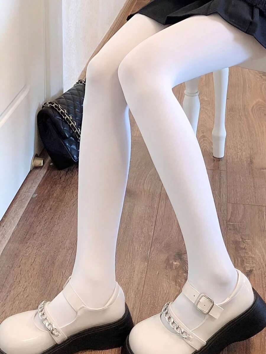 One Pair Of Women's White Velvet Tights. The Pure White Hue Exudes A Gentle And Ethereal Charm, Instantly Brightening Up A Dull Outfit. The High-Elastic Knit Conforms To The Body, Providing A Comfortable Fit Without Digging In, While Also Flattering The Leg Shape, Concealing Minor Imperfections, And Highlighting Slender Lines. - Multicolor - View 1