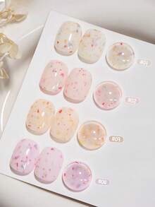 15毫升容量，2026秋冬圣诞季新款女士圣诞礼盒套装，包含流行的甜酸奶冰淇淋糖片、波点、彩色大小亮片、贝壳玻璃纸凝胶指甲油，适合四季美甲。搭配底油和封层使用，需配合UV灯使用。 - 彩色 - 查看 13