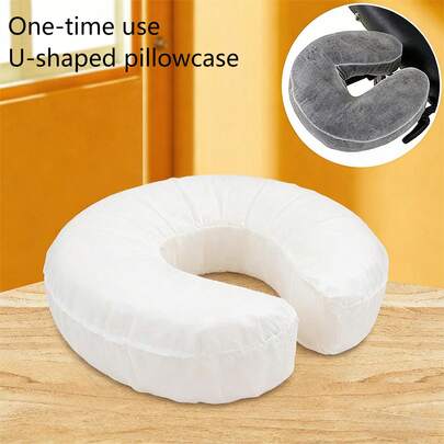 一次性U型枕套，配有透气松紧带，并设有美容枕孔。采用防尘透气无纺布制成，并附有松紧带。适用于专业美容院和按摩店。（不含枕芯）均码。