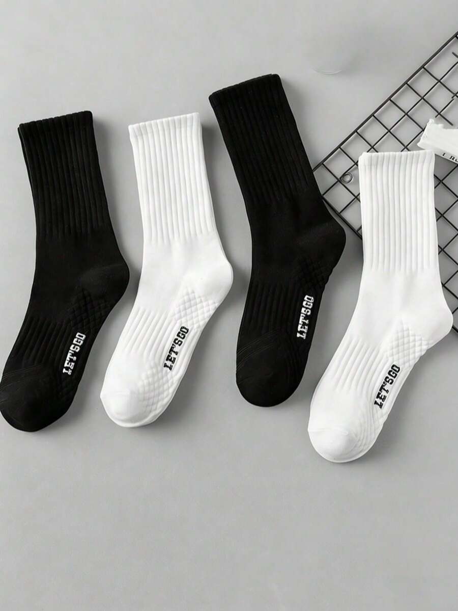 4 Pairs (2 Black, 2 White) Massage Bottom Sports Crew Socks - Black and White - View 1