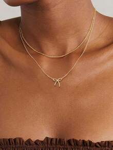 2件套不锈钢蝴蝶结吊坠项链套装，时尚简约蝴蝶结吊坠O型链多层颈链，轻盈奢华独特百搭饰品，适合女孩和女士（珠子数量随机） - 金色 - 查看 1