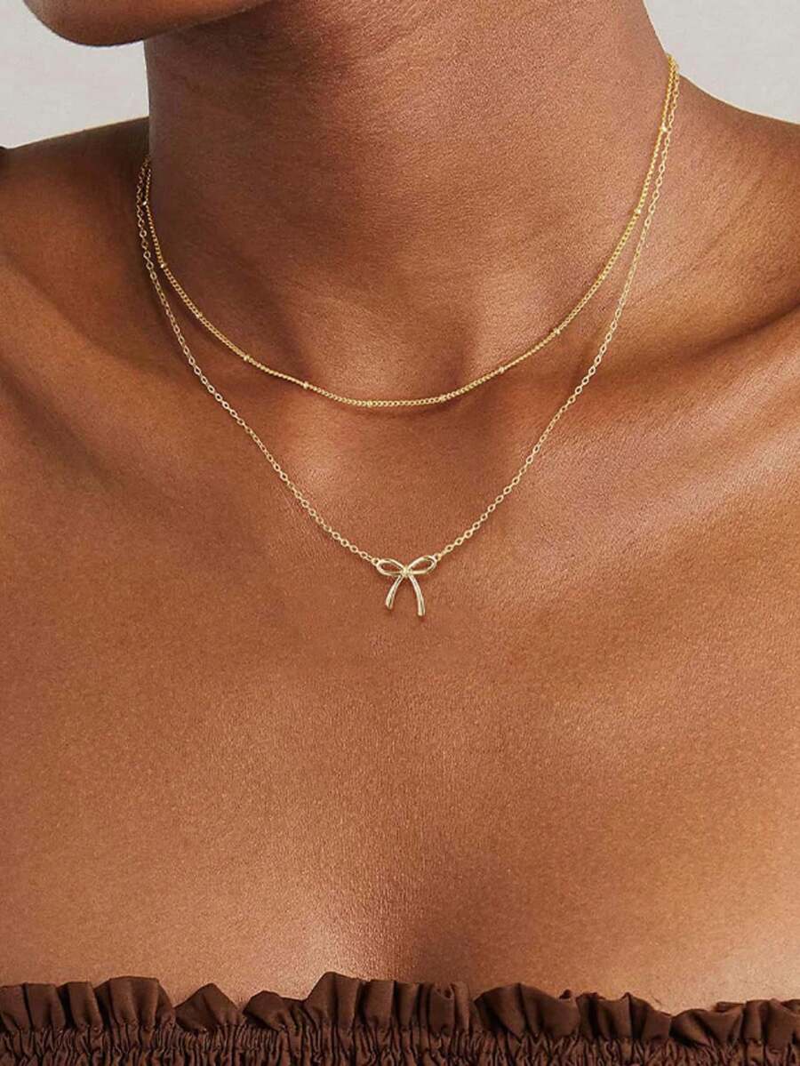 2件套不锈钢蝴蝶结吊坠项链套装，时尚简约蝴蝶结吊坠O型链多层颈链，轻盈奢华独特百搭饰品，适合女孩和女士（珠子数量随机） - 金色 - 查看 1