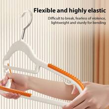 10 chiếc móc treo váy bằng nhựa phủ cao su chống trượt, móc treo quần áo tiết kiệm không gian, chịu lực tốt với móc xoay 360°, móc treo đa năng dùng được cả khi khô và ướt, giúp sắp xếp quần áo gọn gàng trong tủ. - Nhiều màu - Xem 6