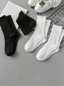 4 Pairs (2 Black, 2 White) Massage Bottom Sports Crew Socks - Black and White - View 2