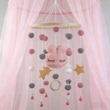 con conejo de fieltro rosa, bolas, estrellas, campanas y anillos de madera. - 1 pza. - Ver 6