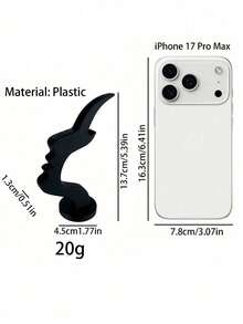 1个侧脸造型眼镜架，独特的弧形设计，塑料材质，兼具艺术收纳功能，可提升桌面或床头柜的装饰格调，简约实用的黑色设计，节日/圣诞礼物之选。