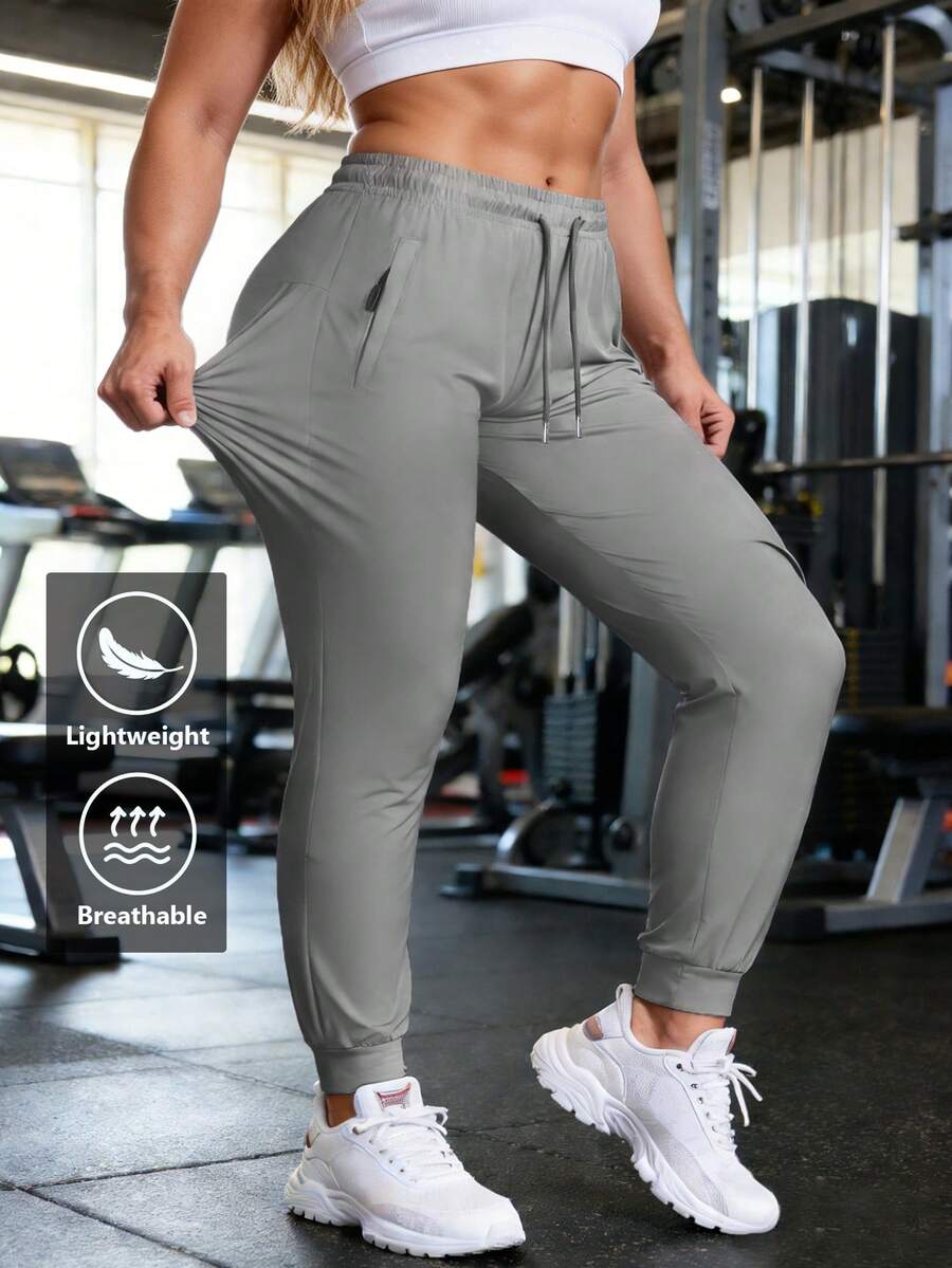 Women's Lightweight Breathable Casual Joggers, High Stretch Quick-Dry Sports Pants With Drawstring Waist & Side Pockets, Loose-Fit Tapered Leg Trousers For Gym, Running, Daily Wear, All-Season Active Bottoms - 灰色 - 查看 1