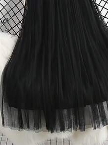 女士优雅褶裥网纱A字半身裙，适合休闲或办公场合穿着，简约优雅 | 涤纶网纱半身裙，四季必备单品，百搭春夏半身裙 黑色 - 黑色 - 查看 4