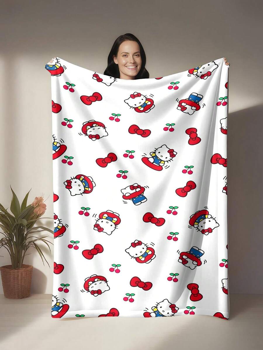SANRIO 这款Hello Kitty主题法兰绒毯以白色为底色，饰有Hello Kitty图案，并点缀着樱桃、蝴蝶结等元素。整体风格柔和甜美，给人以治愈之感，兼具温暖和柔软的特点。可用作沙发毯、午睡毯或床上装饰。