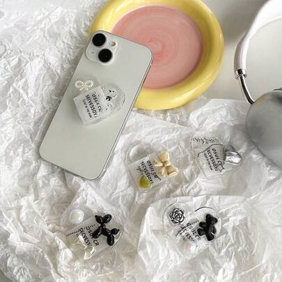 1个环氧树脂爱心狗狗手机支架，闪光熊蝴蝶结花朵装饰，便携配件