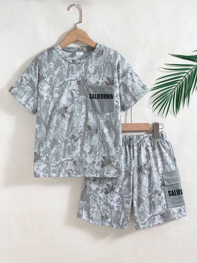 2件套男童休闲外出时尚随机印花图案口袋设计落肩短袖T恤和短裤，带口袋，夏季
