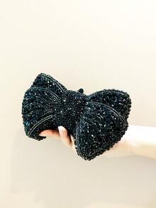 闪耀、优雅、奢华的银色/红色/黑色/金色/浅紫色蝴蝶结水晶晚宴手拿包，手工镶嵌水晶水钻，适合婚礼和新娘佩戴。这款优雅的钻石设计师晚宴手拿包适用于派对、婚礼和盛大晚宴。是送给女性参加派对、婚礼和盛大晚宴的完美礼物。附赠礼盒（不适合放置手机）。 - 黑色 - 查看 3