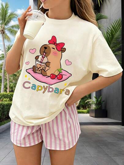 Camiseta de manga corta con cuello redondo y estampado de letras de dibujos animados para niñas preadolescentes, versátil para uso diario