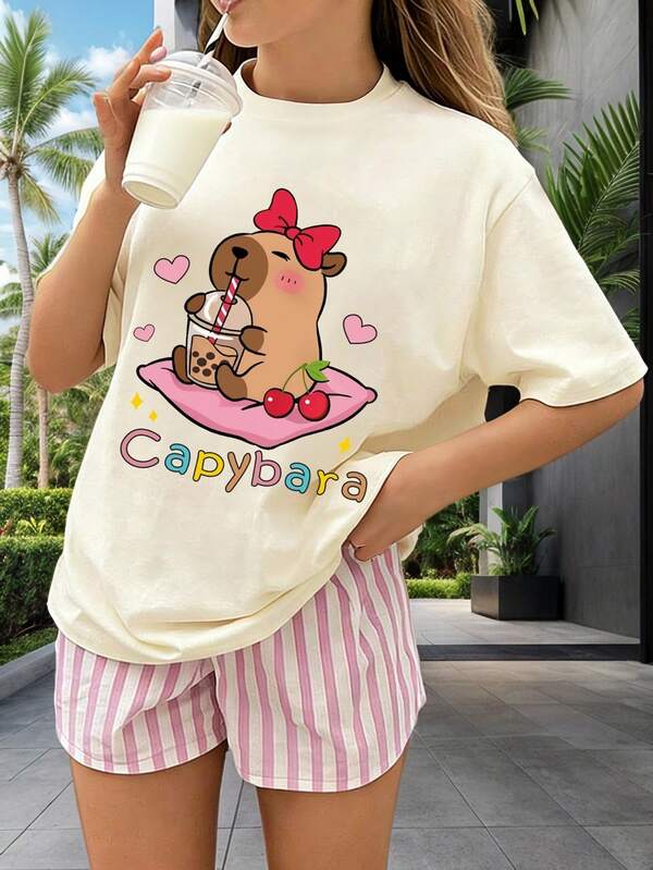 Camiseta de manga corta con cuello redondo y estampado de letras de dibujos animados para niñas preadolescentes, versátil para uso diario