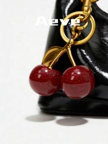 夏季黑色优雅时尚女士新款纯色小丑PU防水手提包，字母图案装饰，拉链封口，方形托特包，酒红色手提包，红色樱桃吊坠装饰，可调节肩带，适合购物、约会、派对、正式场合、度假等场合。 - 黑色 - 查看 3