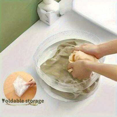 1个便携式折叠水桶 - 透明PVC材质，轻便耐用，适用于露营、旅行、酒店 - 无异味手动洗脚盆、洗脸盆、洗衣盆、酒店用品，半透明设计，材质清晰可见，结构坚固