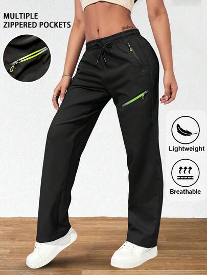 女士休闲运动裤，轻便透气，抽绳腰带，4个拉链口袋，渐变色口袋设计，适合日常休闲穿着、户外运动、跑步等场合，黑色春季款