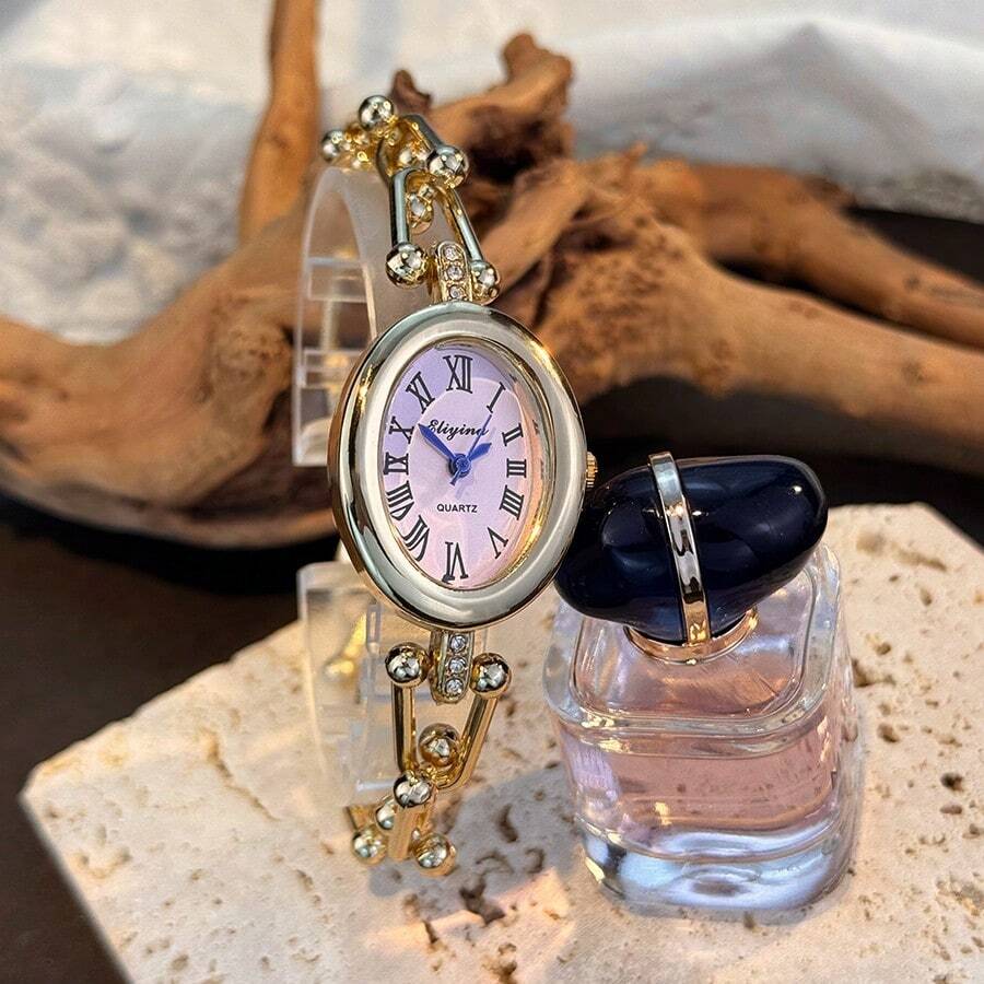 1 chiếc đồng hồ nữ vỏ hợp kim bất đối xứng, dây đeo hình chữ U mới, máy quartz, thời trang cá tính, phù hợp để phối đồ dự tiệc.