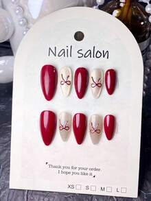 10片手工制作的短款杏仁形假指甲，法式美甲贴纸，红色、粉色、紫色可选，可爱设计，带有猫眼效果和闪粉点缀，蝴蝶结和撞色图案，时尚简约风格，附赠美甲工具，适合秋冬季女性和女孩的美甲用品。 - 彩色 - 查看 5