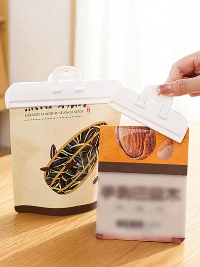 2 مشبك أكياس محكم الإغلاق، مشابك بلاستيكية لتخزين الأطعمة، مشابك مقاومة للرطوبة للأطعمة والوجبات الخفيفة. اكسسوارات تخزين الأطعمة، تنظيم المطبخ، مستلزمات منزلية أساسية.