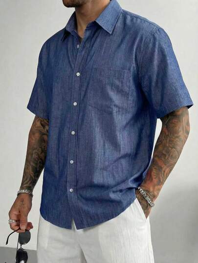Camisa de manga corta de textura de mezclilla azul índigo para hombres, de alta calidad y transpirable, de corte slim, con cuello abotonado a la moda, bolsillos y un elemento esencial del estilo urbano casual